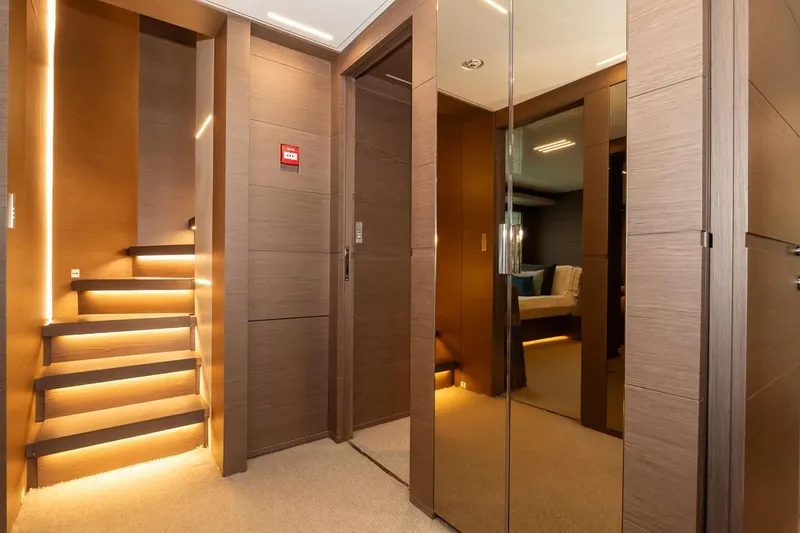 Willpower Yacht Photos Pics Luxurious interior of 2018 FERETTI Navetta 37 yacht with modern lighting and elegant design.