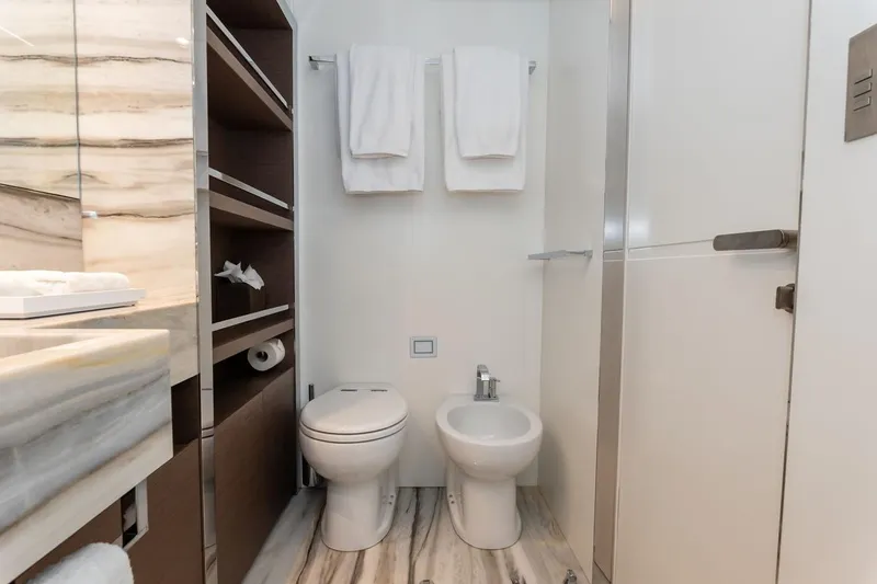 Willpower Yacht Photos Pics Luxury bathroom on 2018 FERETTI Navetta 37 yacht, featuring modern fixtures and elegant design.