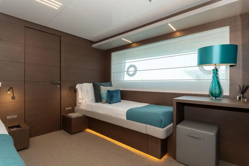 Willpower Yacht Photos Pics Luxurious cabin interior of 2018 FERETTI Navetta 37 yacht with modern decor.