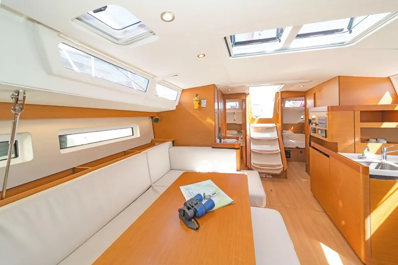  Yacht Photos Pics Interior of 2020 Jeanneau Sun Odyssey 490 yacht, featuring modern design and spacious layout.