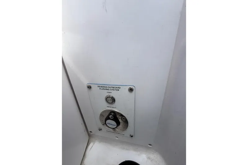  Yacht Photos Pics 2024 Axopar 37 Sun-Top Reverso outboard flushing system control panel.