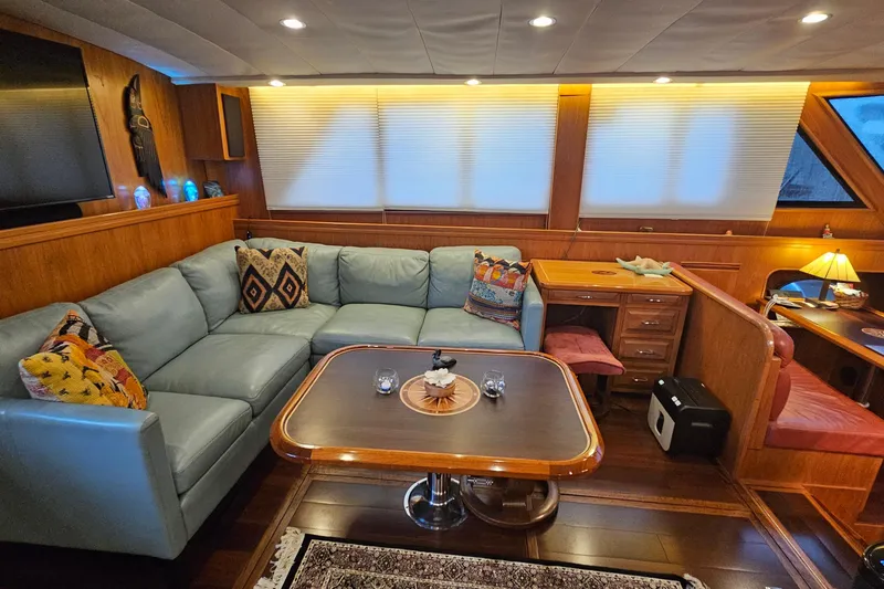 Outbound Yacht Photos Pics Luxurious 1993 Symbol 55 Yachtfisher interior with cozy seating and elegant decor.