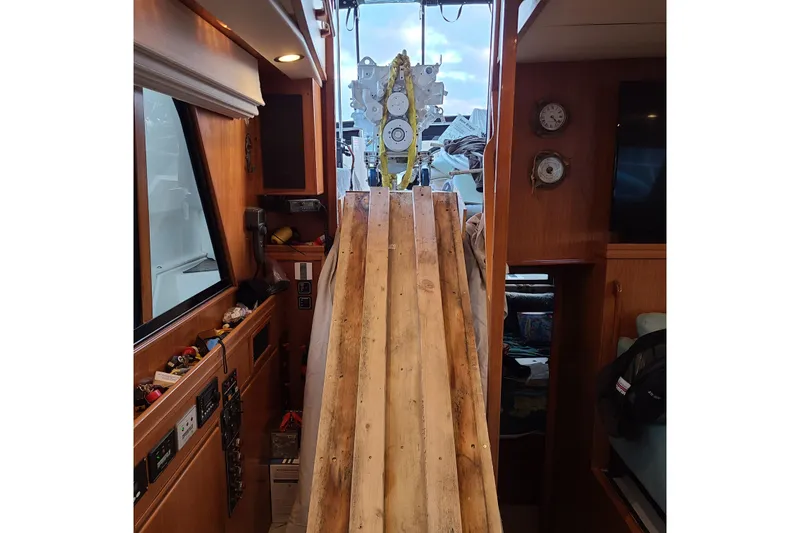 Outbound Yacht Photos Pics Interior of 1993 Symbol 55 Yachtfisher with wooden ramp and nautical decor.