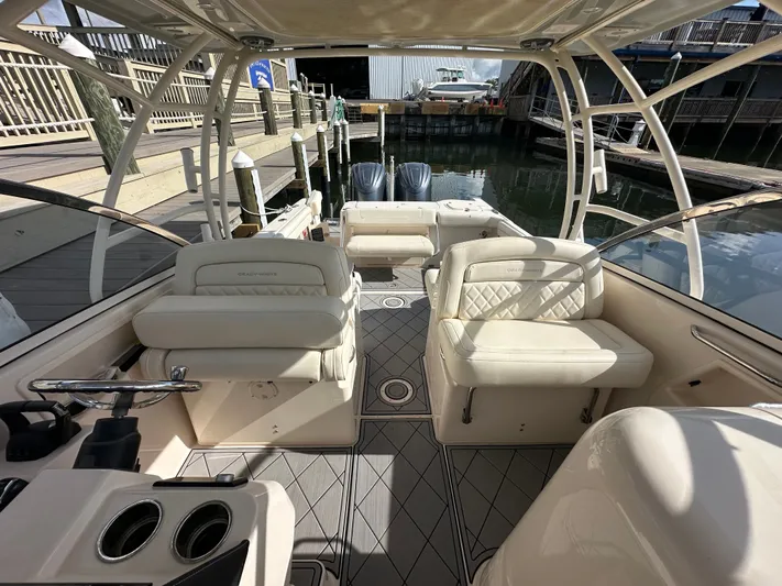  Yacht Photos Pics 2022 Grady-White Freedom 285 boat interior with luxurious seating and modern design.