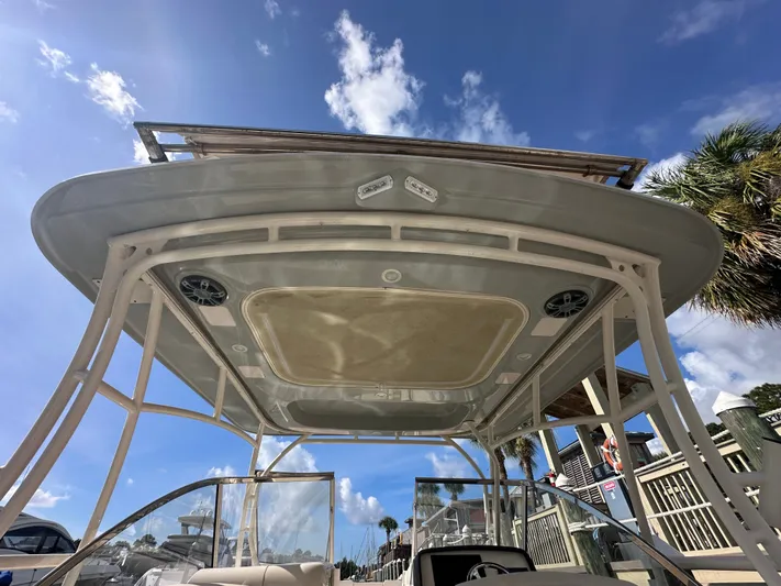  Yacht Photos Pics 2022 Grady-White Freedom 285 boat canopy under clear blue sky.
