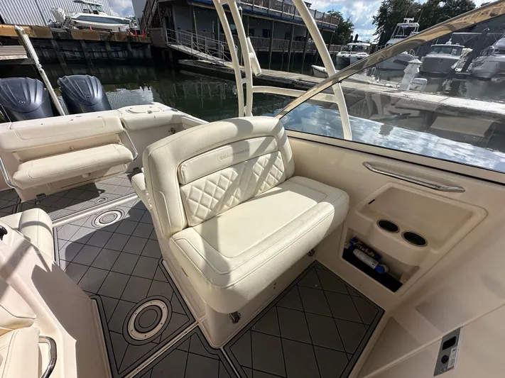  Yacht Photos Pics 2022 Grady-White Freedom 285 boat interior with luxurious seating and modern design.