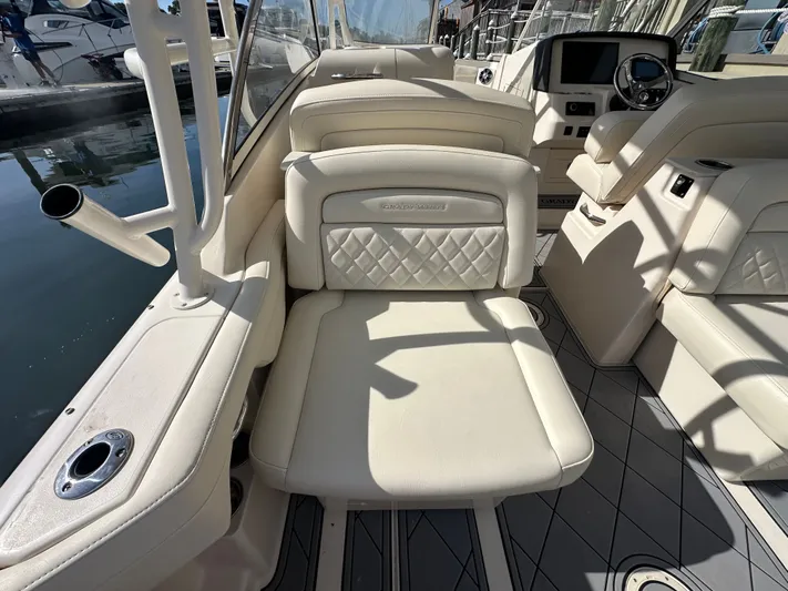  Yacht Photos Pics 2022 Grady-White Freedom 285 boat interior with luxurious seating and modern dashboard.