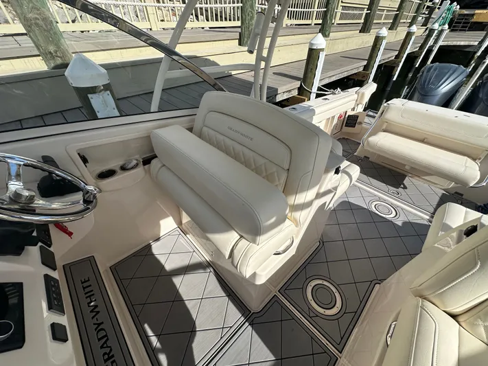  Yacht Photos Pics 2022 Grady-White Freedom 285 boat interior with luxurious seating and modern design.
