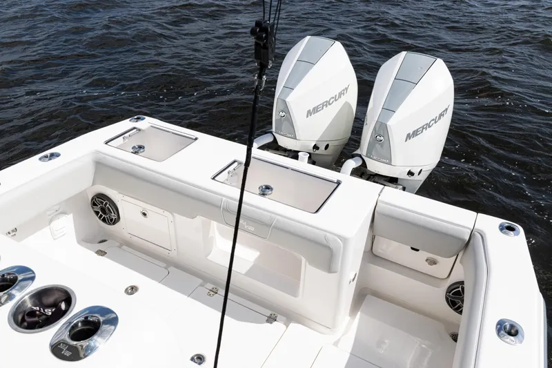  Yacht Photos Pics 2024 SeaVee 290B boat with dual Mercury engines on open water.