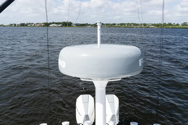  Yacht Photos Pics 2024 SeaVee 290B boat with radar system on calm water.