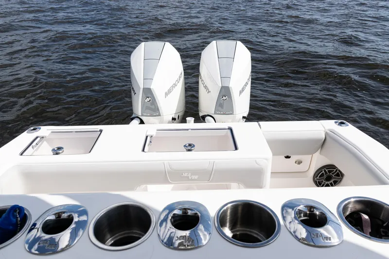  Yacht Photos Pics 2024 SeaVee 290B boat with dual Mercury engines on open water.