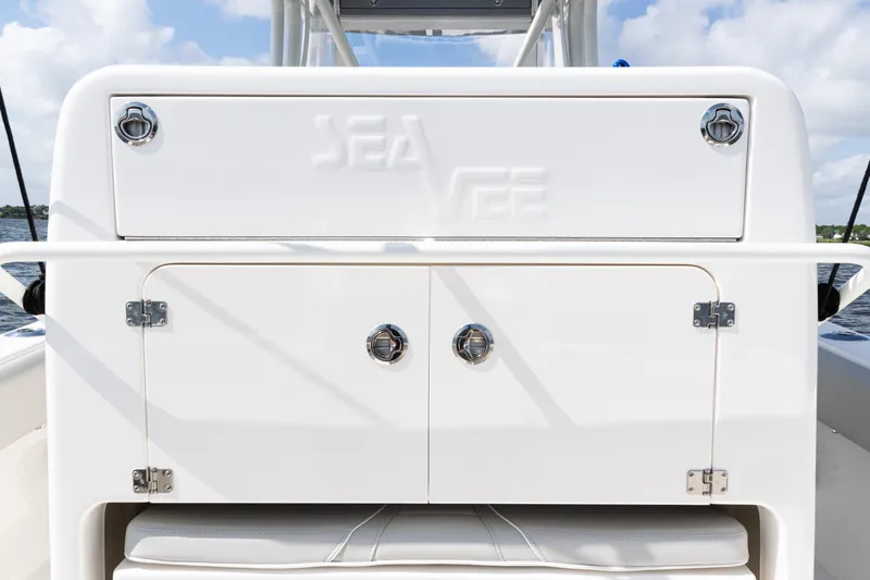  Yacht Photos Pics 2024 SeaVee 290B boat interior with storage compartments and sleek design.