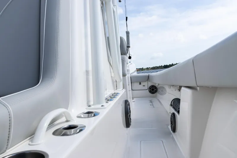  Yacht Photos Pics 2024 SeaVee 290B boat interior with sleek white design and modern features.
