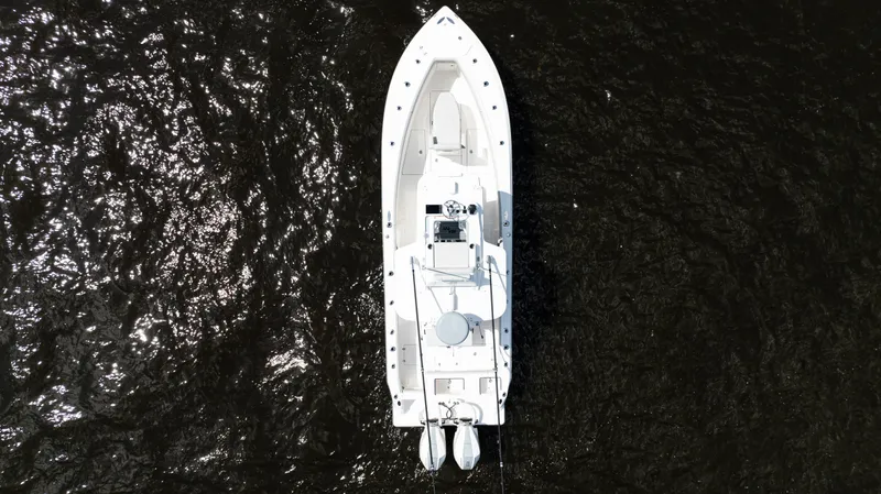  Yacht Photos Pics Aerial view of 2024 SeaVee 290B boat on dark water.