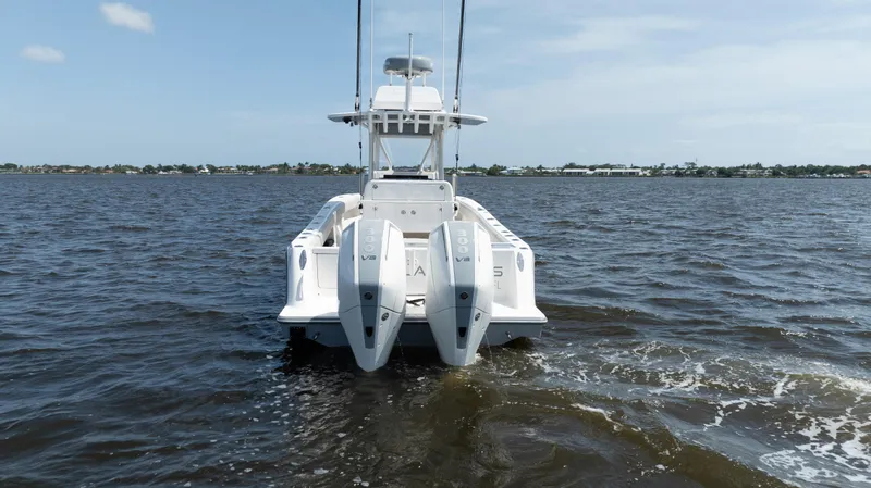  Yacht Photos Pics 2024 SeaVee 290B boat with dual engines on open water.