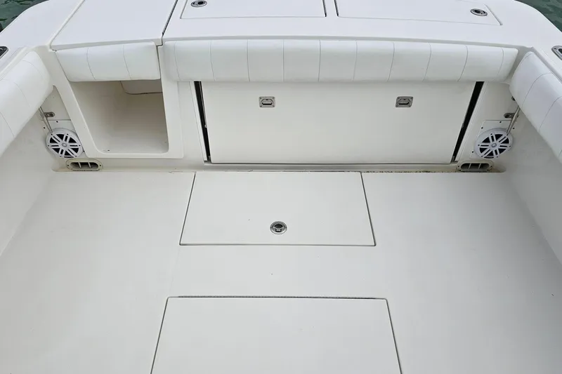 Redemption Yacht Photos Pics 2012 Regulator 34SS boat deck with storage compartments and speakers.