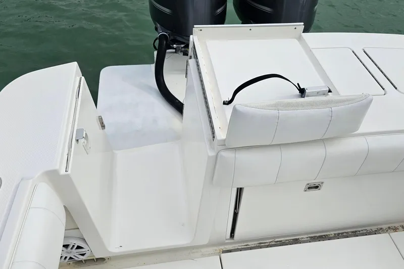 Redemption Yacht Photos Pics 2012 Regulator 34SS boat with white seating and dual outboard motors.