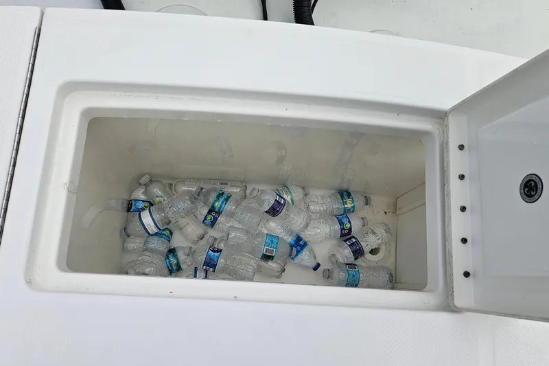 Redemption Yacht Photos Pics Cooler on 2012 Regulator 34SS boat filled with water bottles.