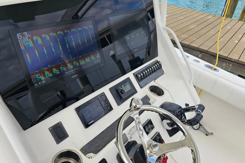 Redemption Yacht Photos Pics 2012 Regulator 34SS boat dashboard with Garmin navigation and control systems.