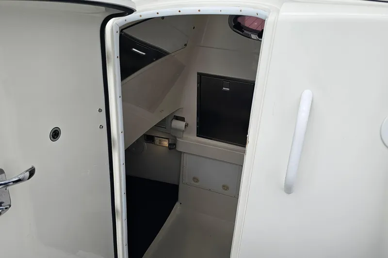 Redemption Yacht Photos Pics Interior cabin view of a 2012 Regulator 34SS boat, featuring a compact design.