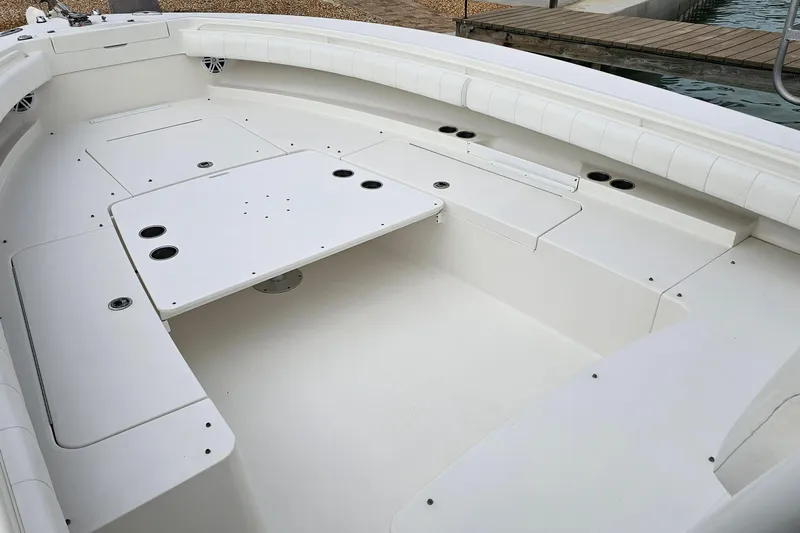 Redemption Yacht Photos Pics 2012 Regulator 34SS boat interior with spacious seating and storage compartments.