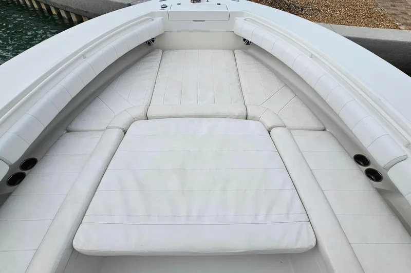 Redemption Yacht Photos Pics 2012 Regulator 34SS boat with spacious white cushioned seating area.