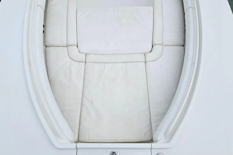 Redemption Yacht Photos Pics 2012 Regulator 34SS boat with white cushioned seating area.