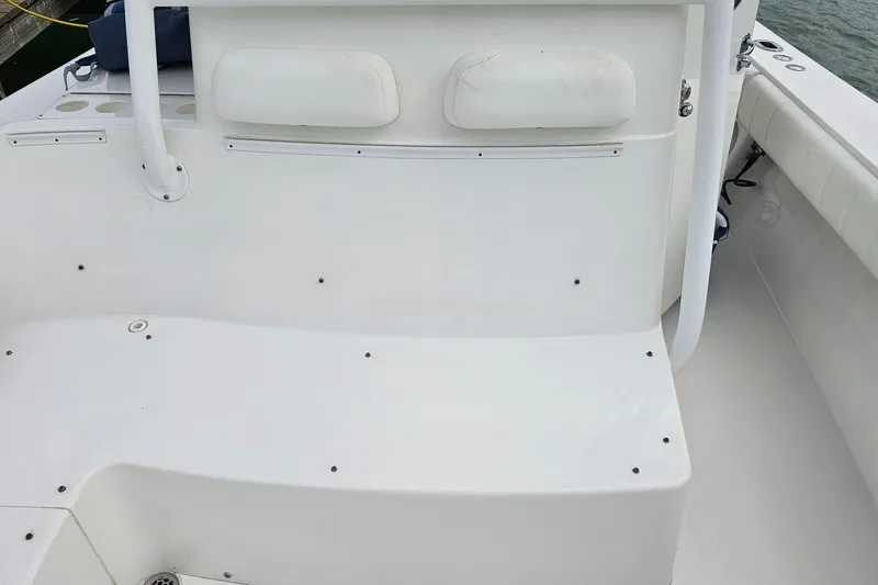 Redemption Yacht Photos Pics 2012 Regulator 34SS boat interior, featuring white seating and clean design.