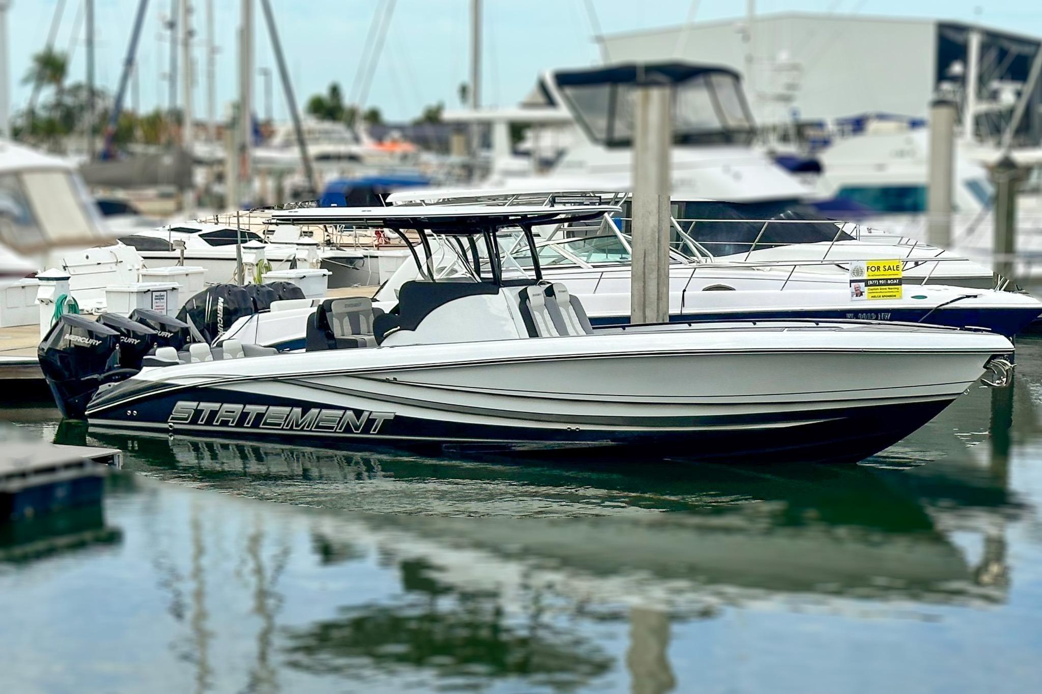 2024 Statement 350 Open boat docked in marina, sleek design, powerful engines.