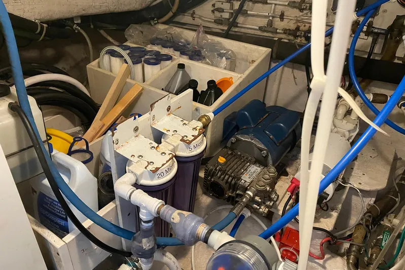 Aventis Yacht Photos Pics Engine room of a 1999 McKinna 57 Pilothouse with filters and machinery.