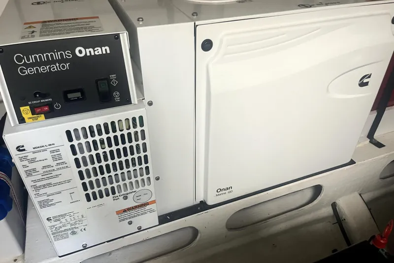  Yacht Photos Pics Cummins Onan generator in 2020 Cayman Yachts S520, marine engine room setup.