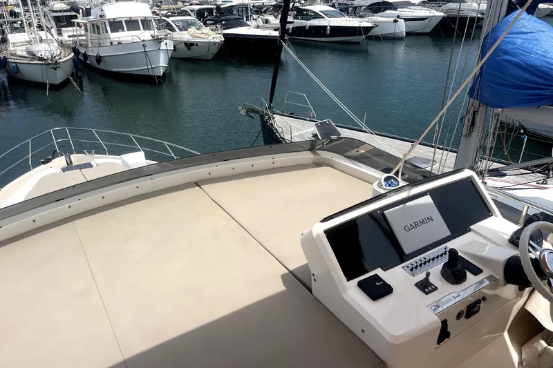  Yacht Photos Pics Luxury Cayman Yachts S520, 2020 model, docked at marina with Garmin navigation system.