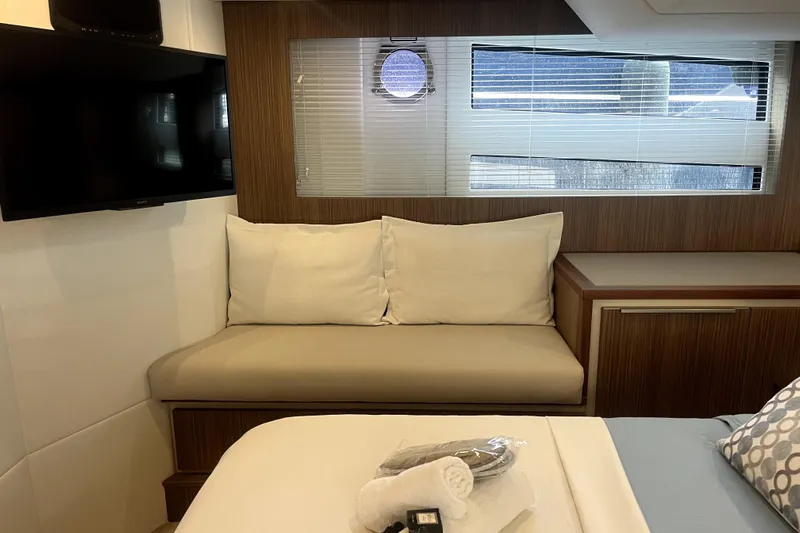  Yacht Photos Pics Luxurious interior of 2020 Cayman Yachts S520 with cozy seating and modern amenities.
