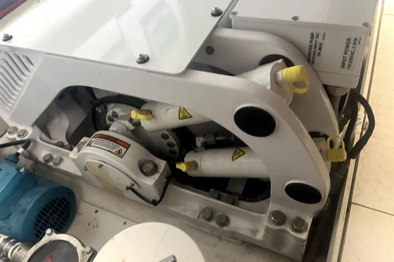  Yacht Photos Pics Engine compartment of a 2020 Cayman Yachts S520, showcasing mechanical components and wiring.