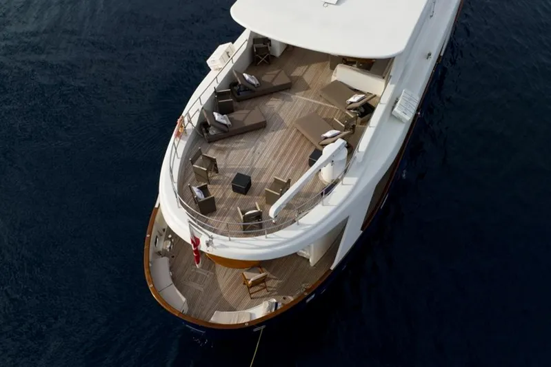 Don Ciro Yacht Photos Pics Aerial view of 2002 Benetti Sail Division 105 yacht with elegant deck seating.