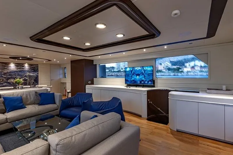 Don Ciro Yacht Photos Pics Luxurious interior of 2002 Benetti Sail Division 105 yacht with modern furnishings.