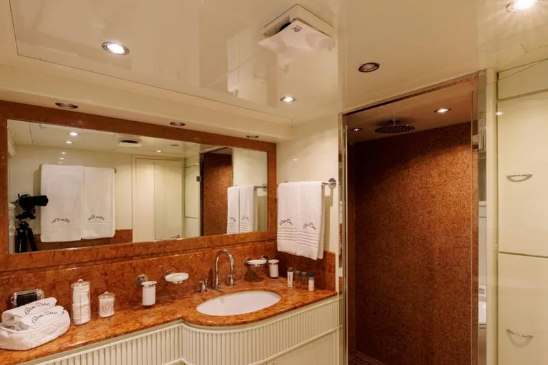 Don Ciro Yacht Photos Pics Luxurious bathroom on 2002 Benetti Sail Division 105 yacht, featuring elegant fixtures and spacious design.