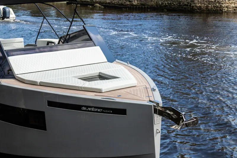  Yacht Photos Pics 2024 De Antonio Yachts D28 Cruiser on water, showcasing sleek design and luxury features.