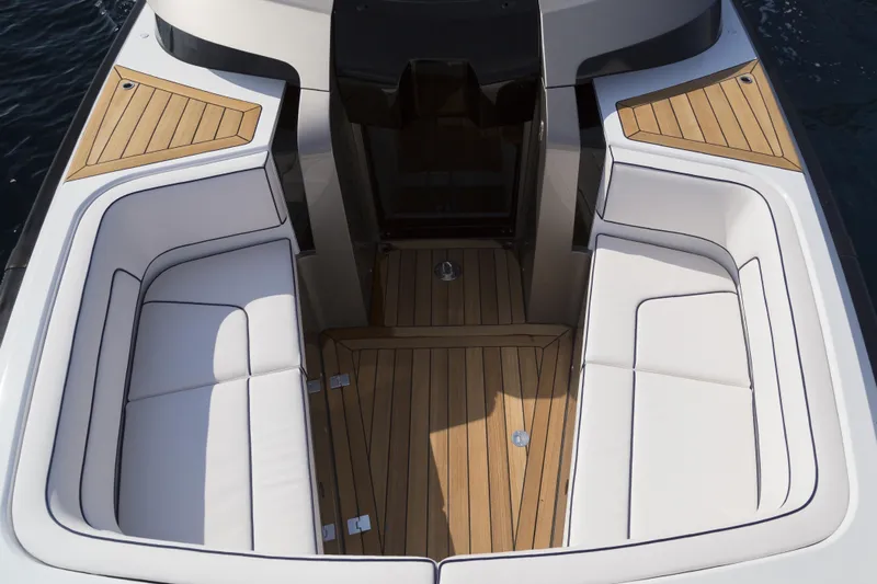  Yacht Photos Pics Luxurious 2028 Maori Limo yacht interior with elegant white seating and wooden flooring.