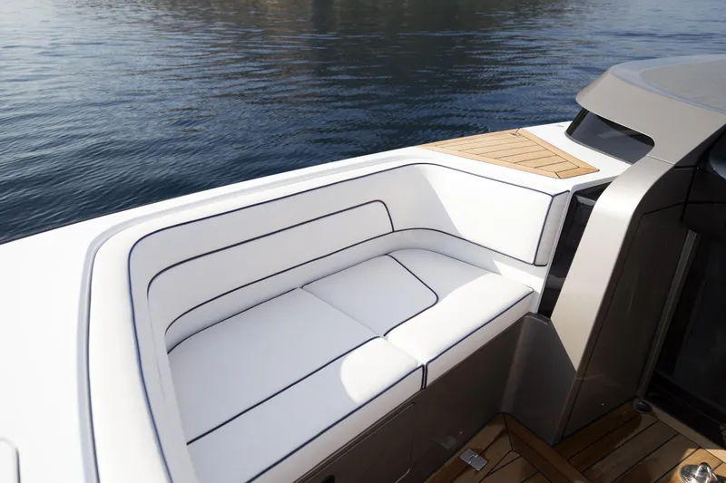  Yacht Photos Pics Luxurious seating on 2028 Maori Limo yacht with sleek design and waterfront view.