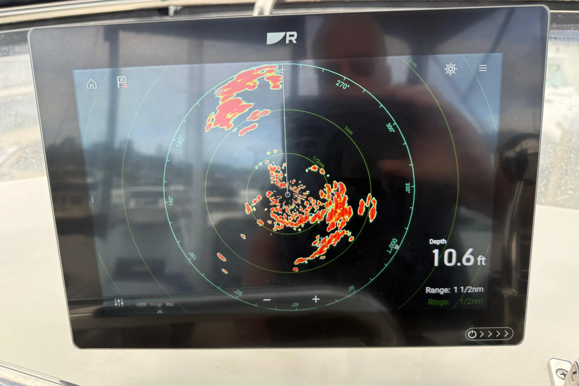 Radar display on a 1997 Grand Banks Classic showing depth and range data.