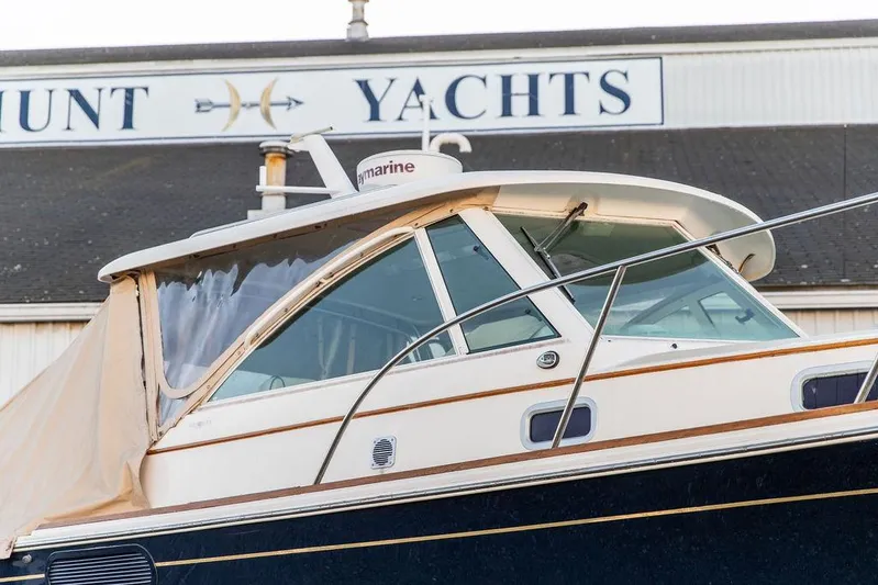 Merocha Yacht Photos Pics 2008 Hunt Yachts Surfhunter 29 boat at dockside, featuring sleek design and cabin enclosure.