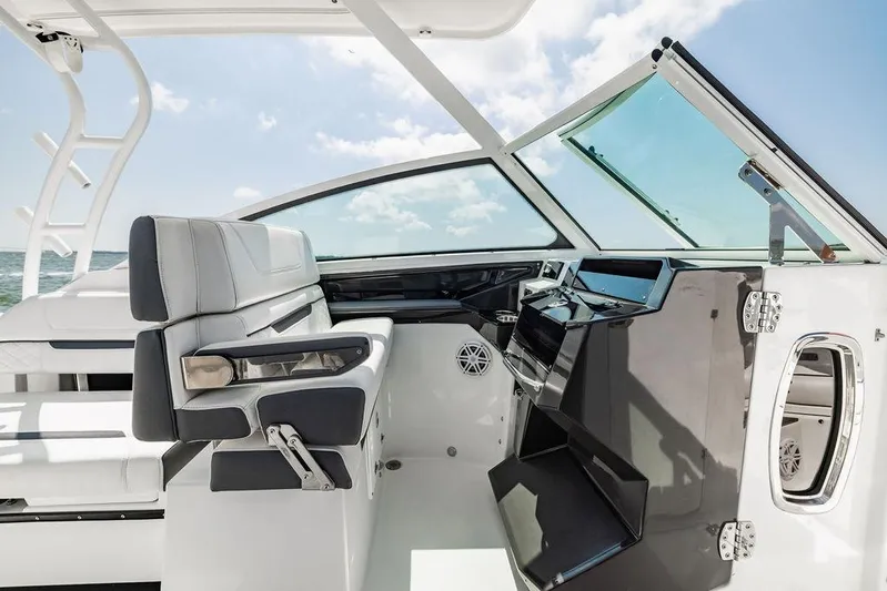  Yacht Photos Pics 2021 Blackfin 272 DC boat interior with modern helm and seating.