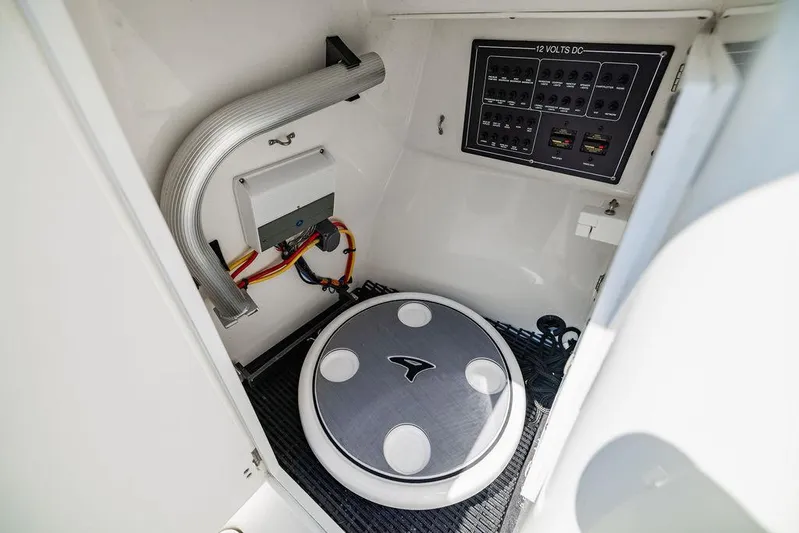  Yacht Photos Pics 2021 Blackfin 272 DC boat interior with control panel and wiring.