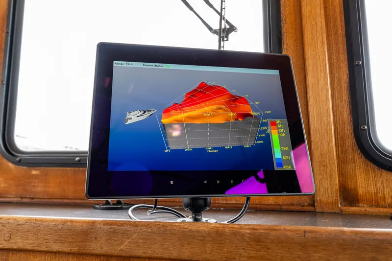 John Hunter Yacht Photos Pics Tablet displaying navigation data on a 2000 Nordic Tug 37 boat dashboard.