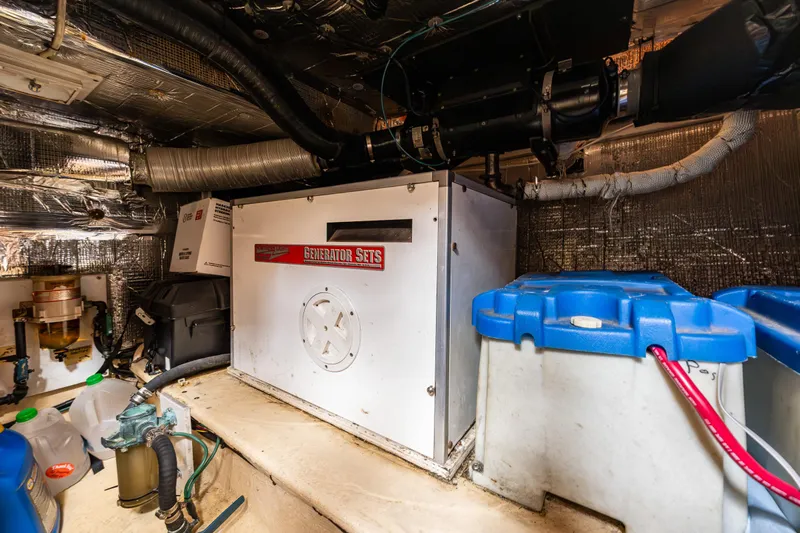 John Hunter Yacht Photos Pics Engine room of a 2000 Nordic Tug 37 with generator and equipment.