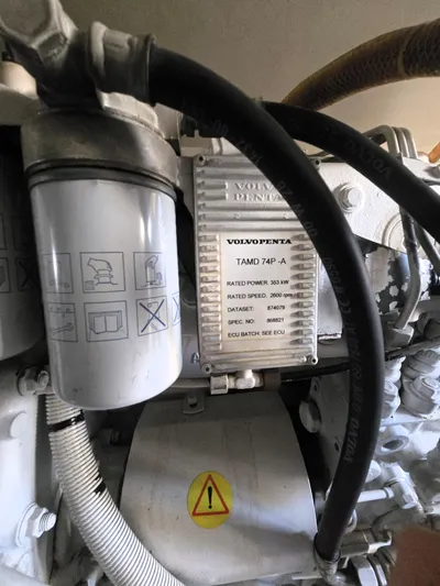 Relentless Yacht Photos Pics Volvo Penta engine in 2001 Ocean Yachts 43 Super Sport, close-up view.