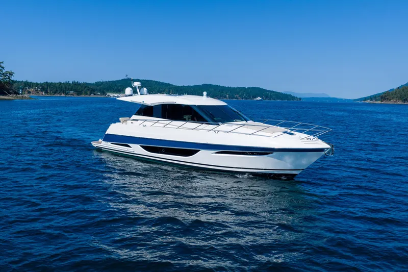 City Lights Yacht Photos Pics 2021 Maritimo X50 yacht cruising on blue ocean waters.