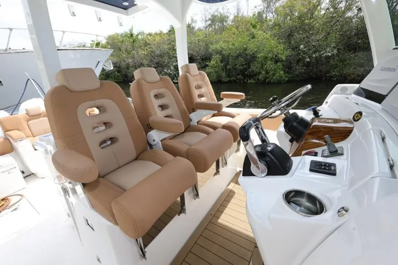 Bada Bing Yacht Photos Pics 2020 HCB 39 Speciale boat interior with luxurious seating and modern helm controls.
