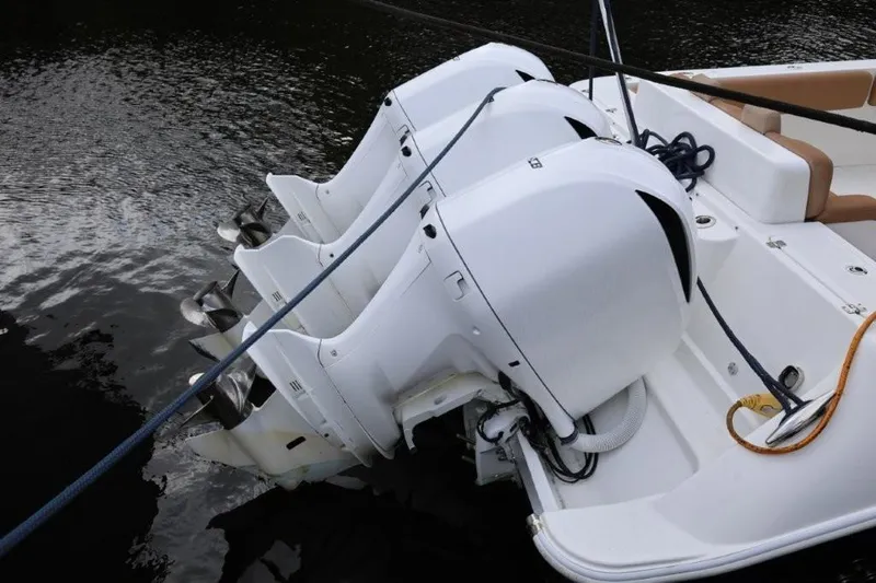 Bada Bing Yacht Photos Pics 2020 HCB 39 Speciale boat with triple outboard engines on water.